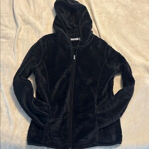 Warm cozy plush nice looking zip up jacket in good condition. Ladies size small.
